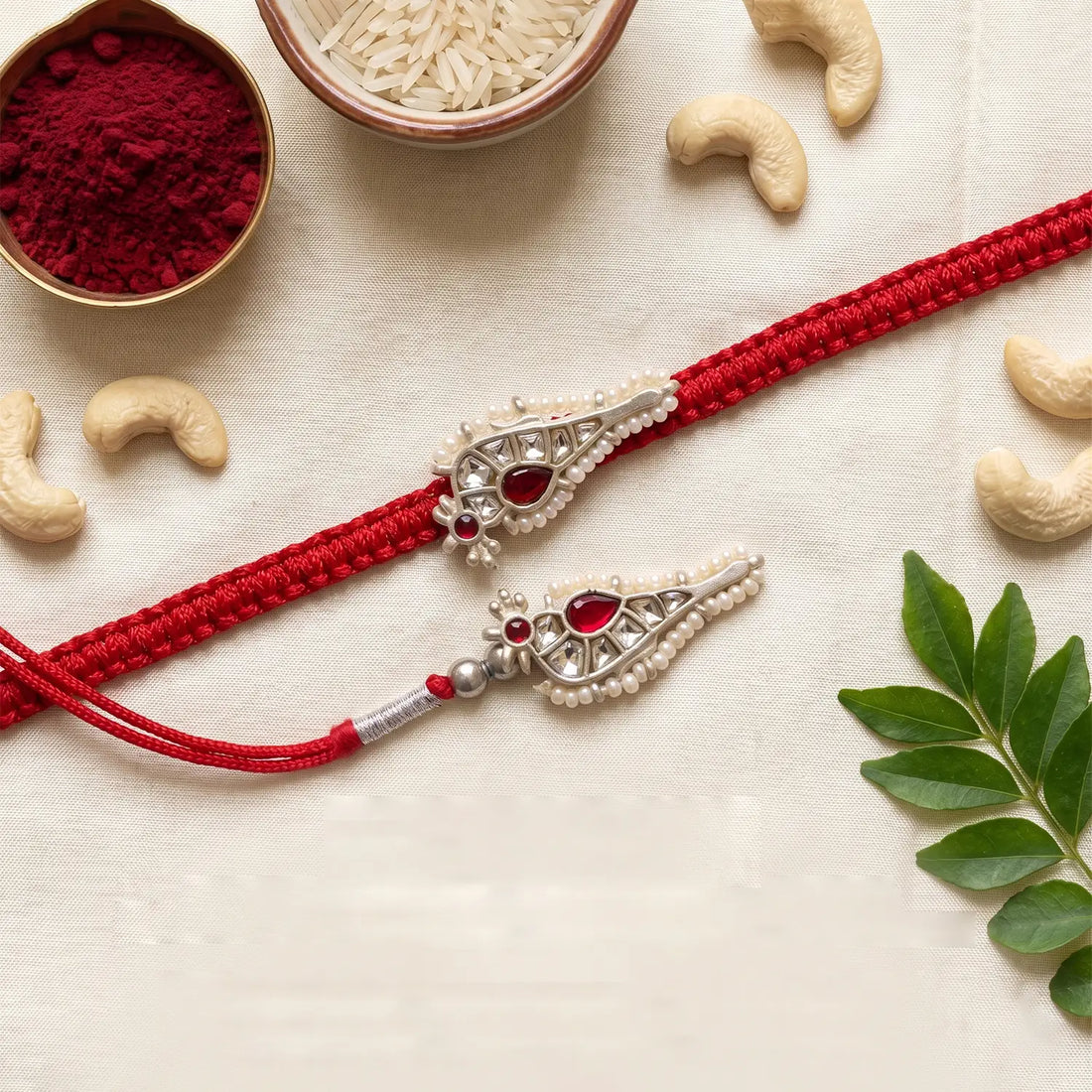Premium Silver Rakhi with Ruby Stone & Pearl Detailing - Made With Pure 925 Silver