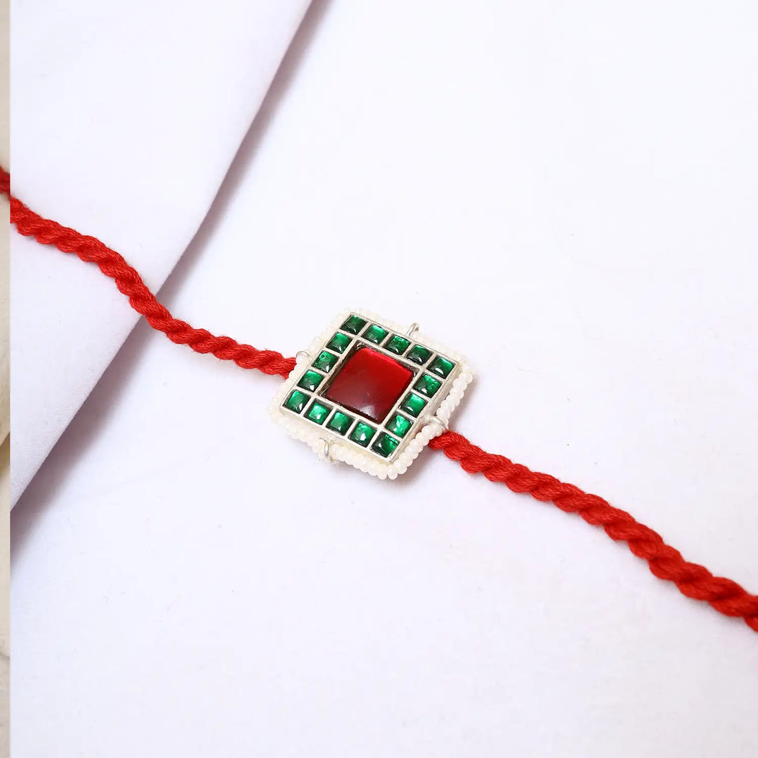 Traditional Silver Rakhi with Red & Green Stone Design - Made With Pure 925 Silver