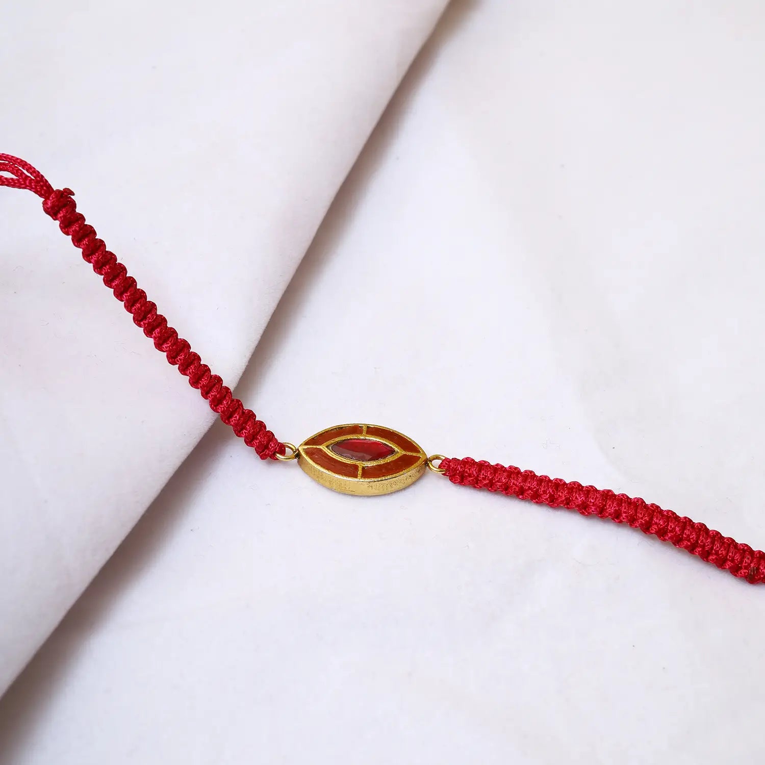Elegant Silver Rakhi with Red Stone Accent - Made With Pure 925 Silver