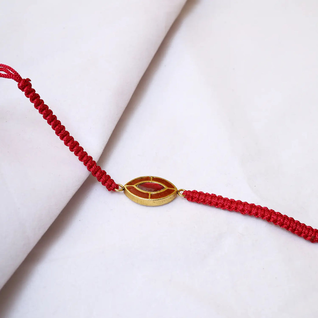 Elegant Silver Rakhi with Red Stone Accent - Made With Pure 925 Silver