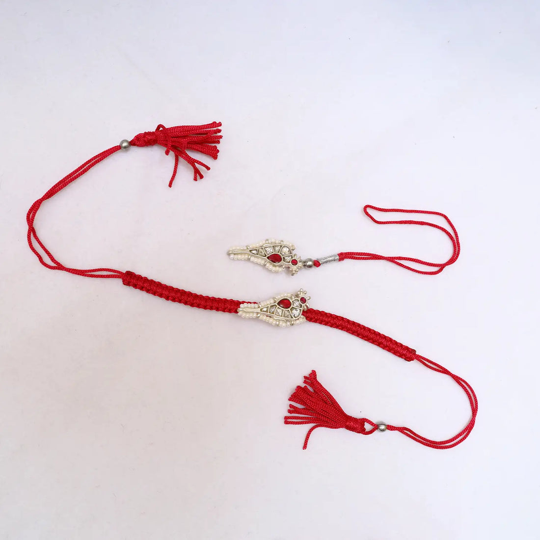 Premium Silver Rakhi with Ruby Stone & Pearl Detailing - Made With Pure 925 Silver