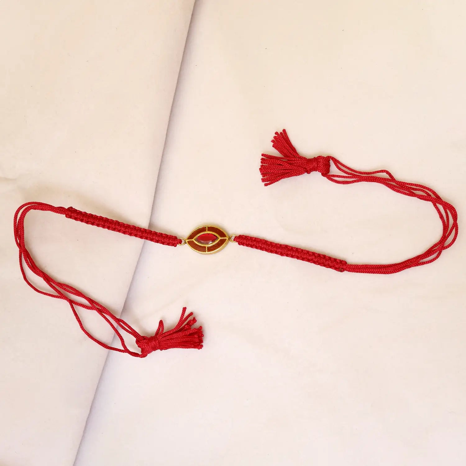 Elegant Silver Rakhi with Red Stone Accent - Made With Pure 925 Silver